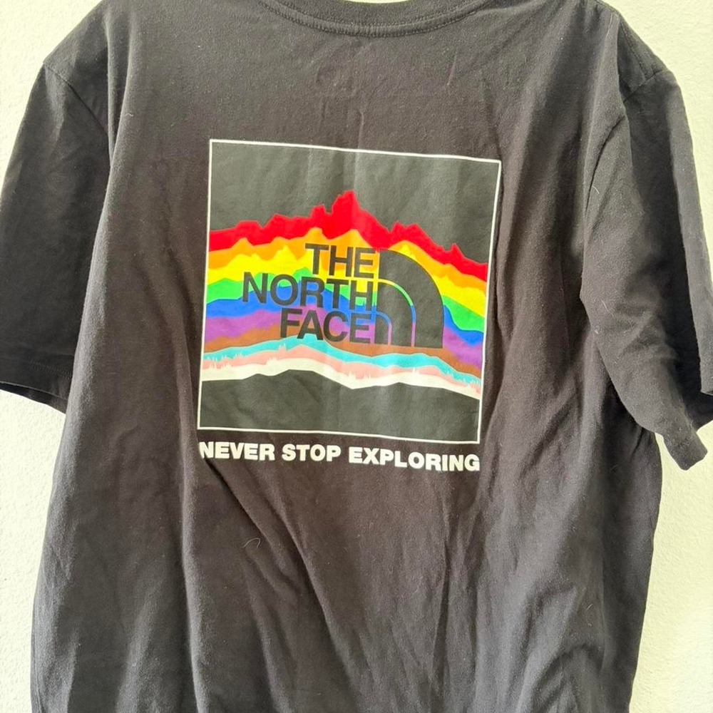 The North Face black t-shirt with rainbow design. Size M